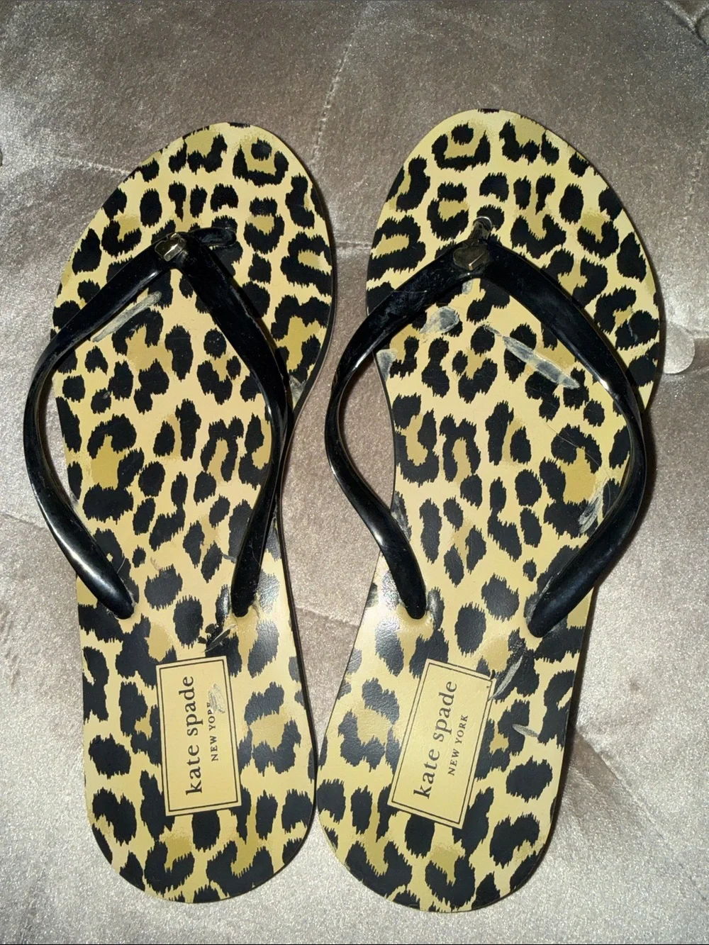 Kate Spade black strap flip-flops with spade logo